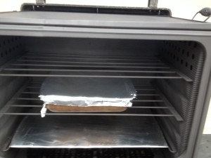 chocolate pudding cake baking in camp oven