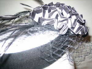 linen feather and french veiling pillbox hat